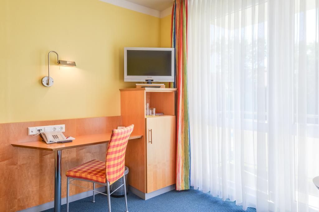 Hotel Beim Schrey Kirchheim bei Muenchen Стая снимка